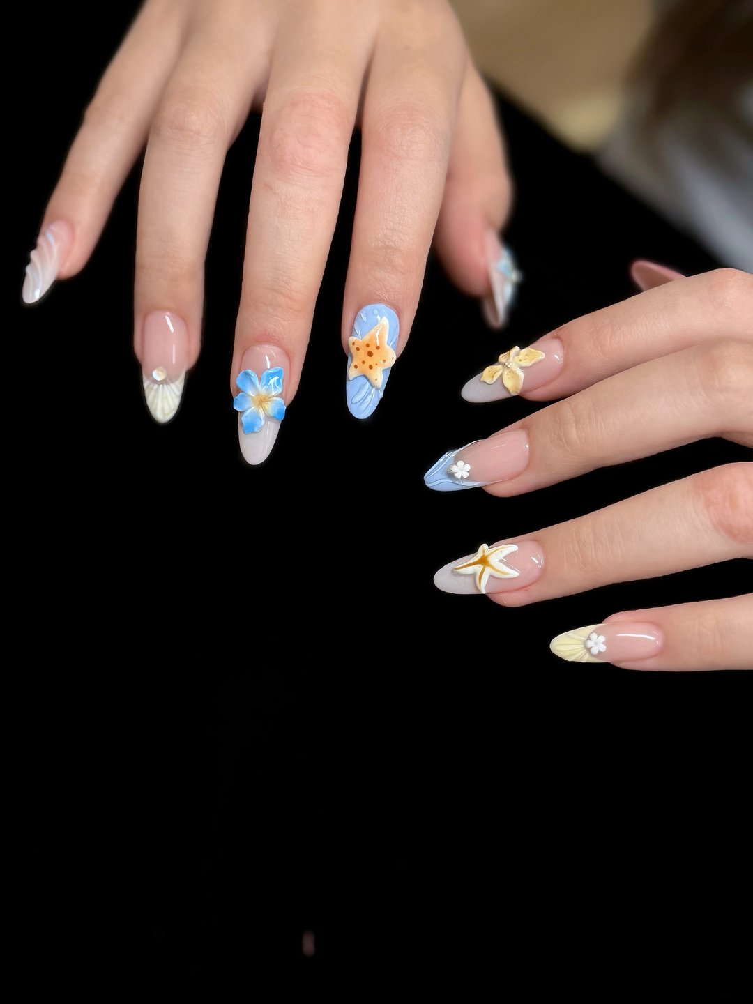 Pastel iridescent Gel-X with hand-painted floral and pearl accents at L2 Nail Salon Mountain View