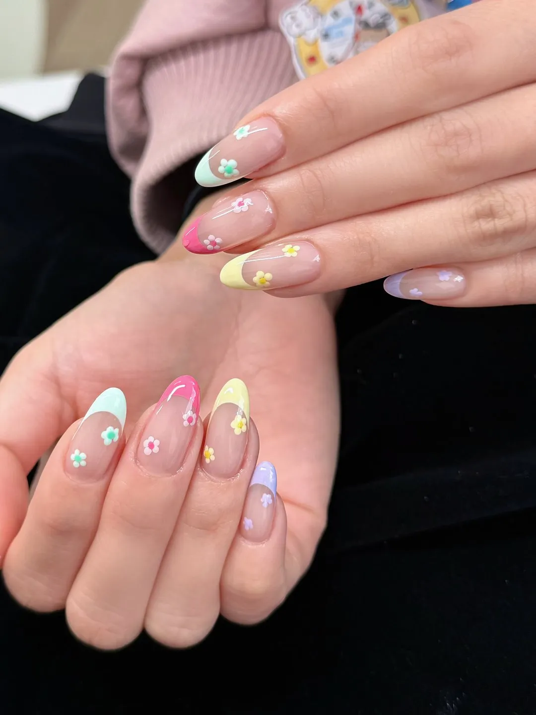 Pastel almond Gel-X with hand-painted flowers and charms at L2 Nail Salon Mountain View