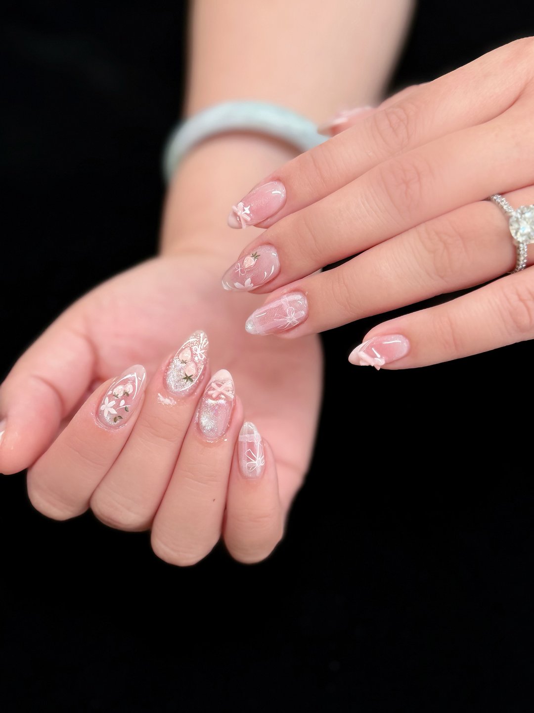 Pearl iridescent Gel-X with floral charms at L2 Nail Salon Mountain View